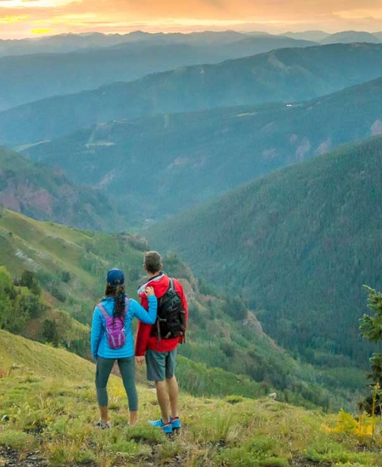 Couple hiking on top of hill