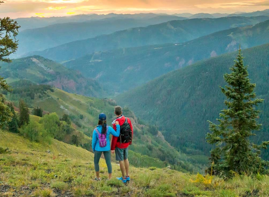 Couple hiking on top of hill