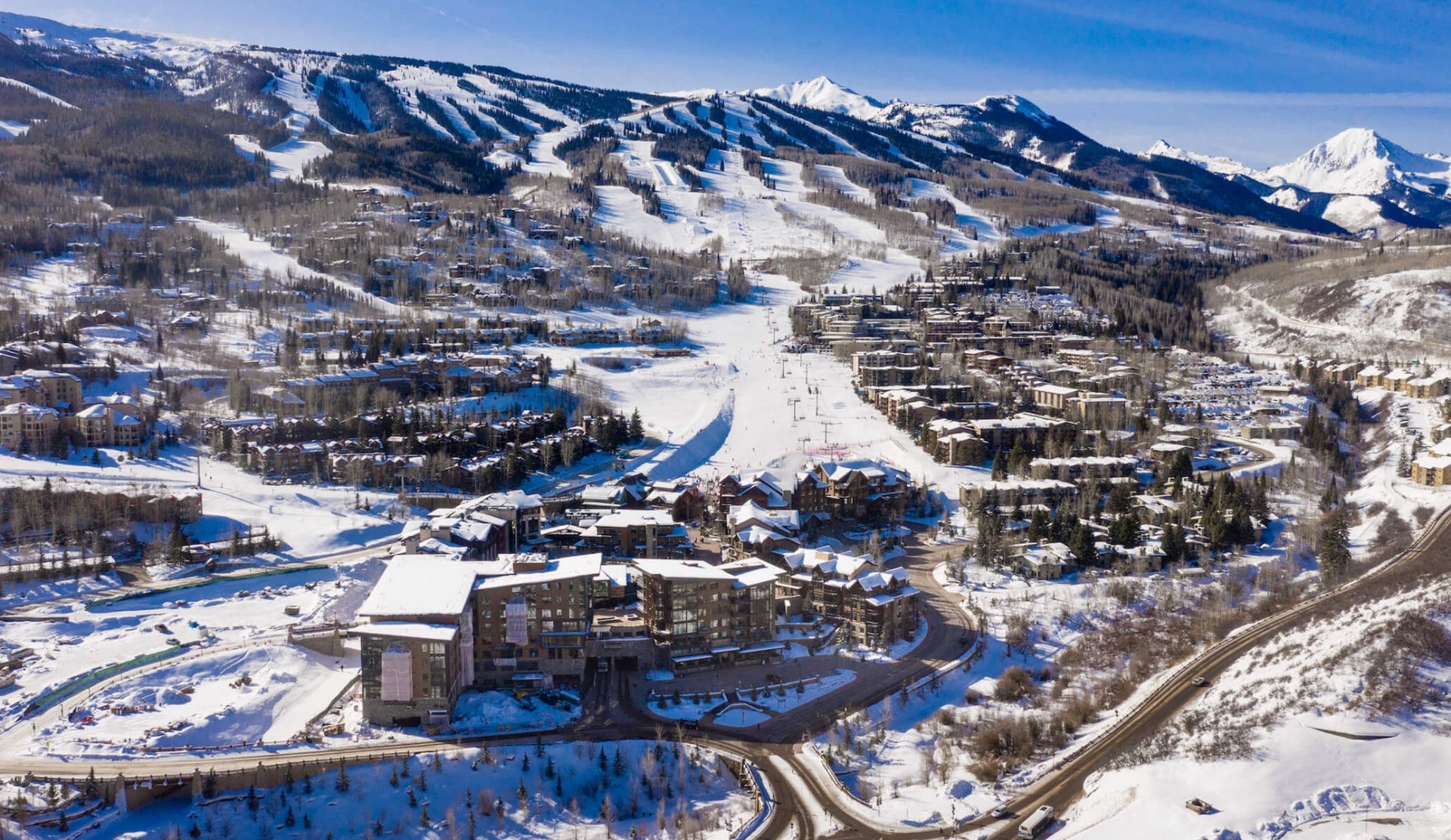 An aerial view of a ski town during winter