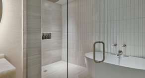 penthouse master bathroom with tub