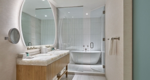 penthouse master bathroom with tub