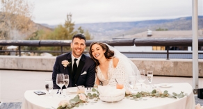 Bride and groom at dinner table