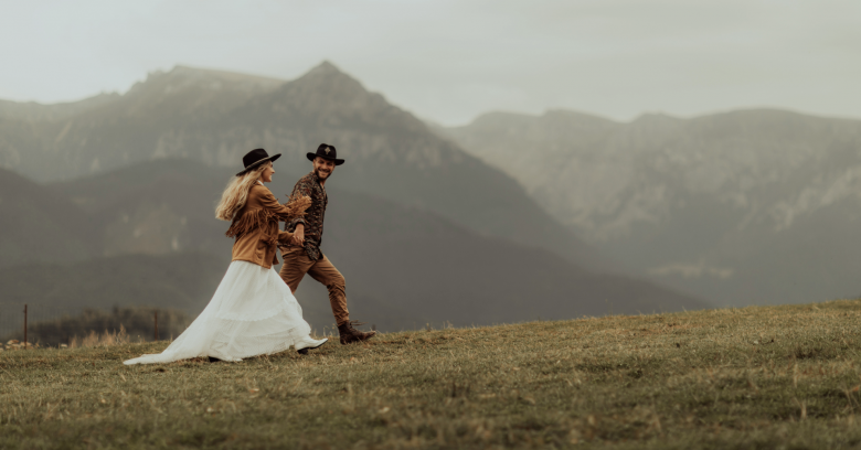 Wedding Couple against mountain backdrop